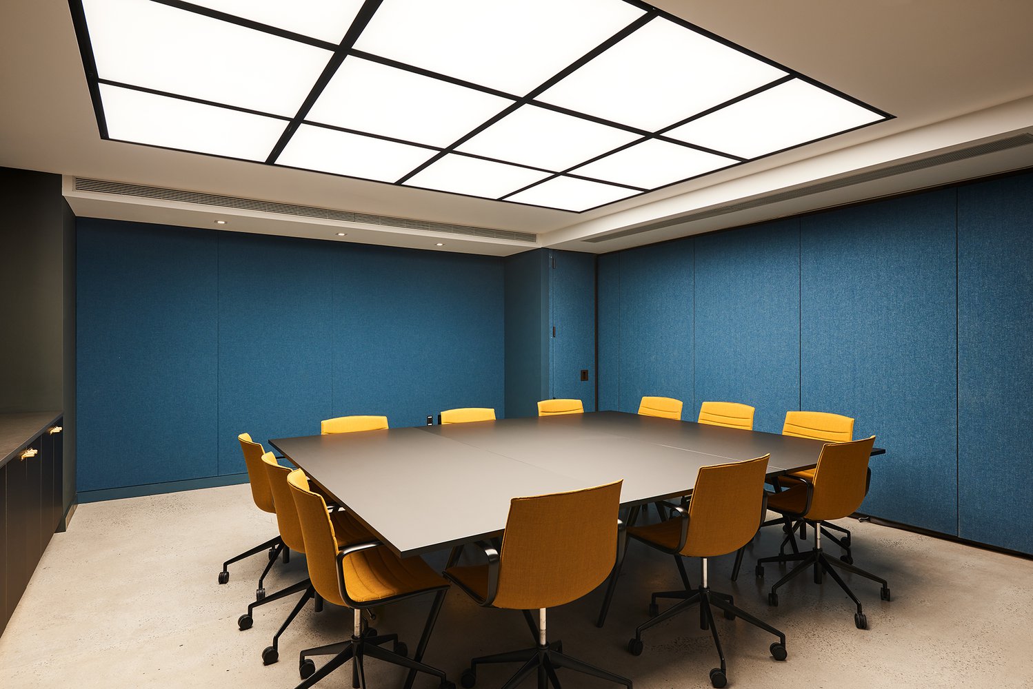 Square shaped conference room table with chairs
